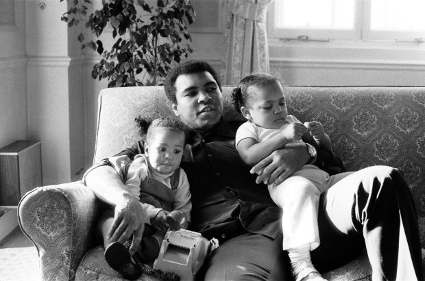Muhammad Ali is seen cuddling his daughters Laila, (L ) and Hana (R) at a Hotel in London, Britain December 19, 1978.Mandatory Credit: Action Images / MSI/File Photo EDITORIAL USE ONLY.