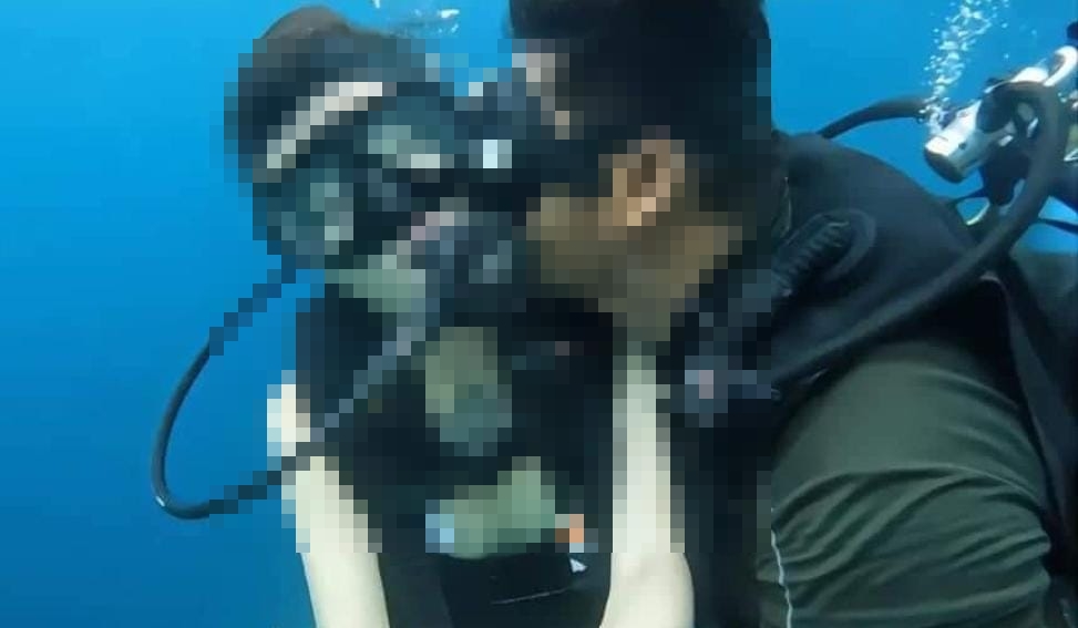 Polis Tahan Pembantu Jurulatih Selam Cium Pelancong Wanita